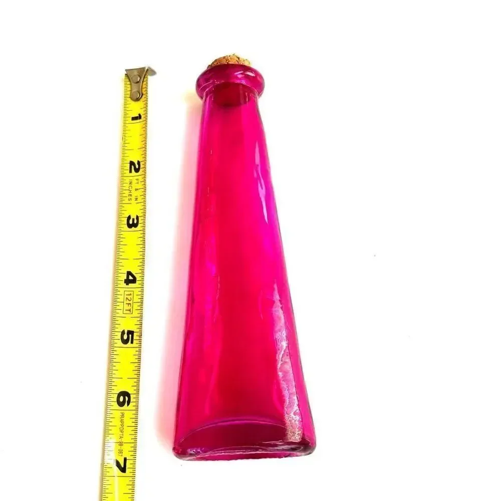 Vintage pink bottle with cork